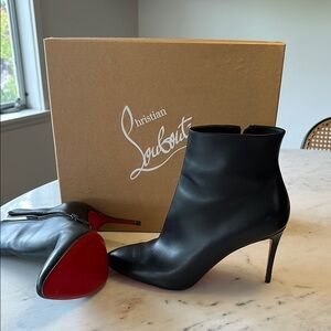 Christian Louboutin Black and Red Heeled Boots with Iconic Elegance